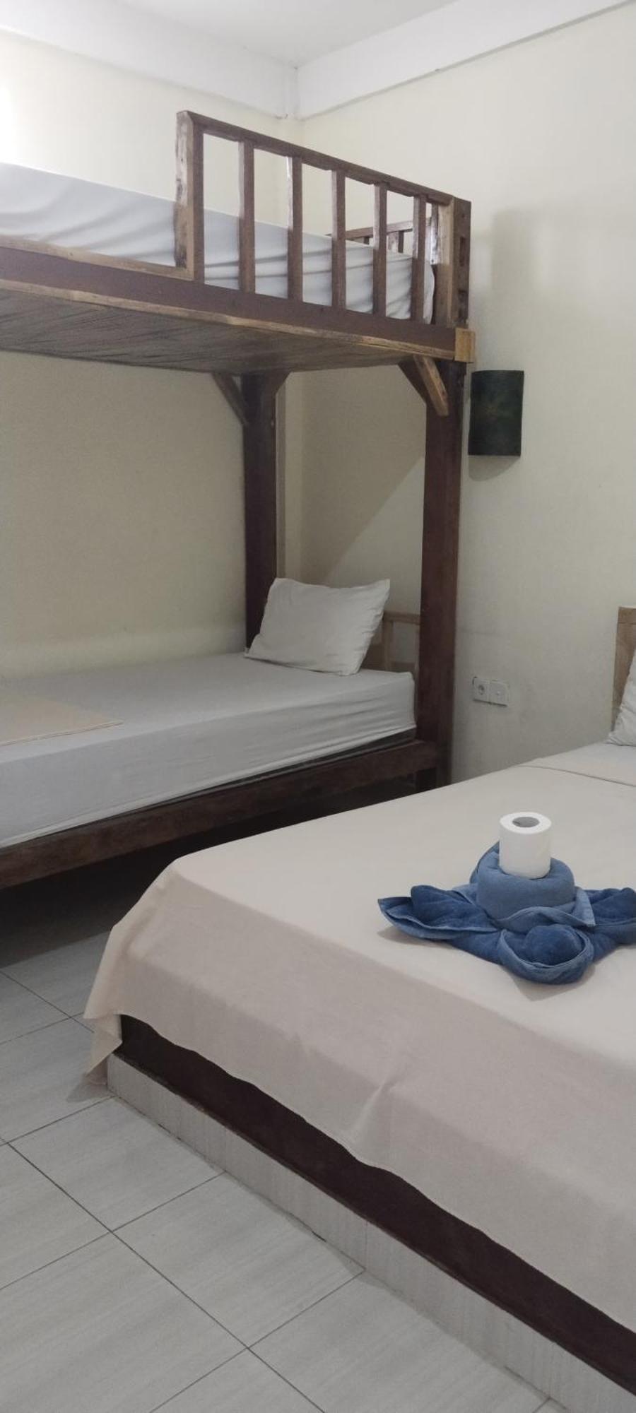 Amed Stop Inn Homestay, Rooftop Restaurant And Bar Exterior foto