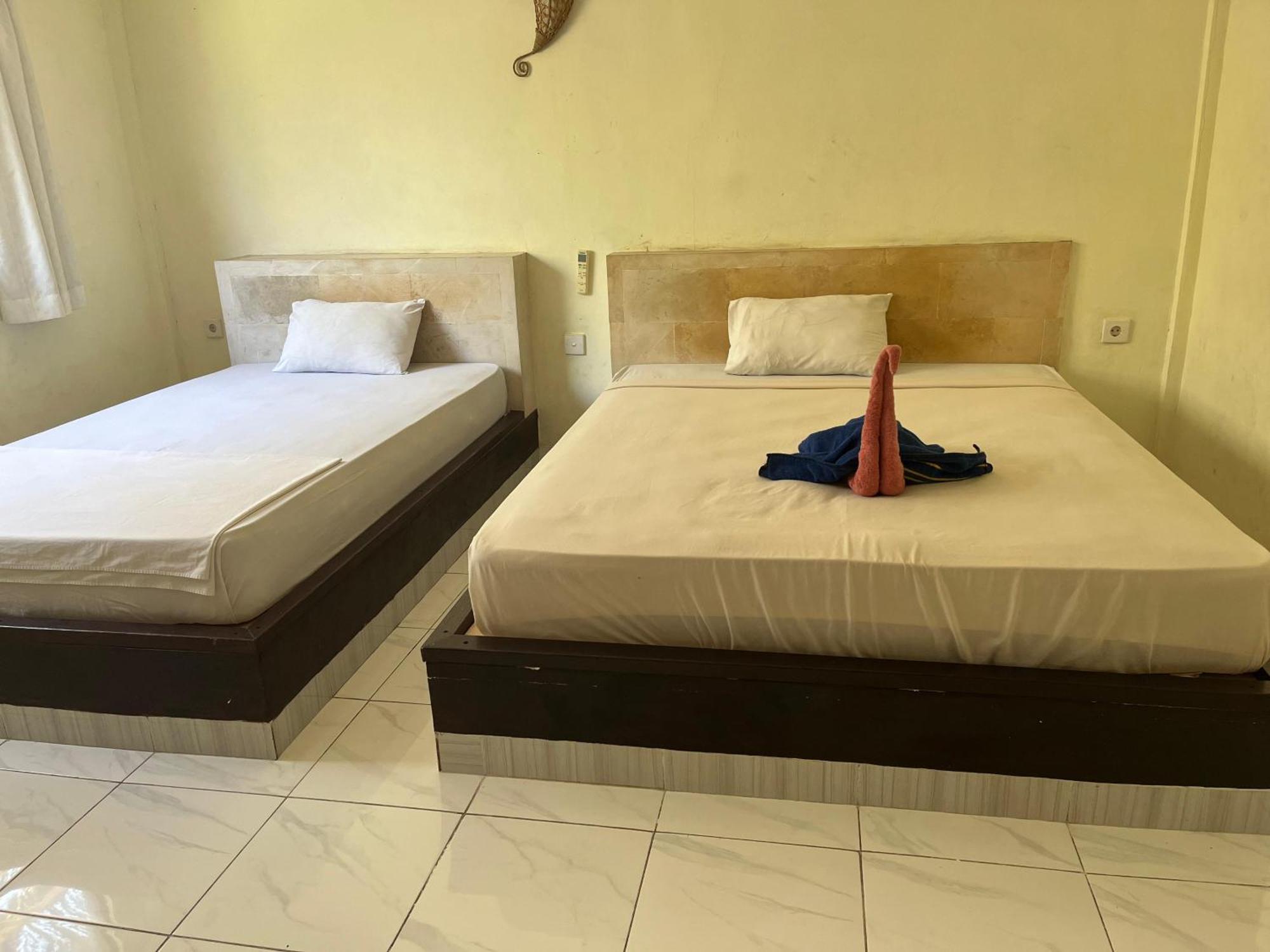 Amed Stop Inn Homestay, Rooftop Restaurant And Bar Exterior foto