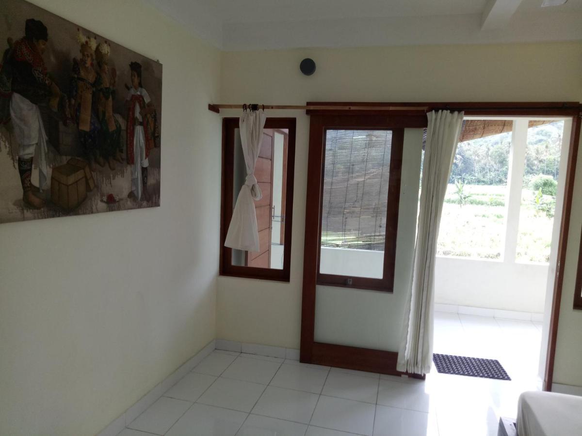 Amed Stop Inn Homestay, Rooftop Restaurant And Bar Exterior foto