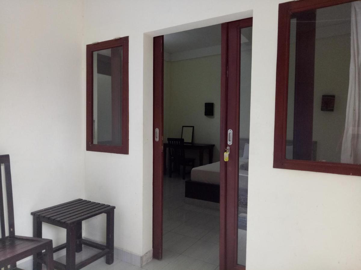 Amed Stop Inn Homestay, Rooftop Restaurant And Bar Exterior foto