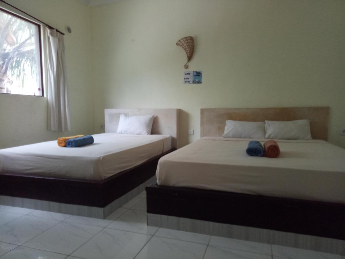 Amed Stop Inn Homestay, Rooftop Restaurant And Bar Exterior foto